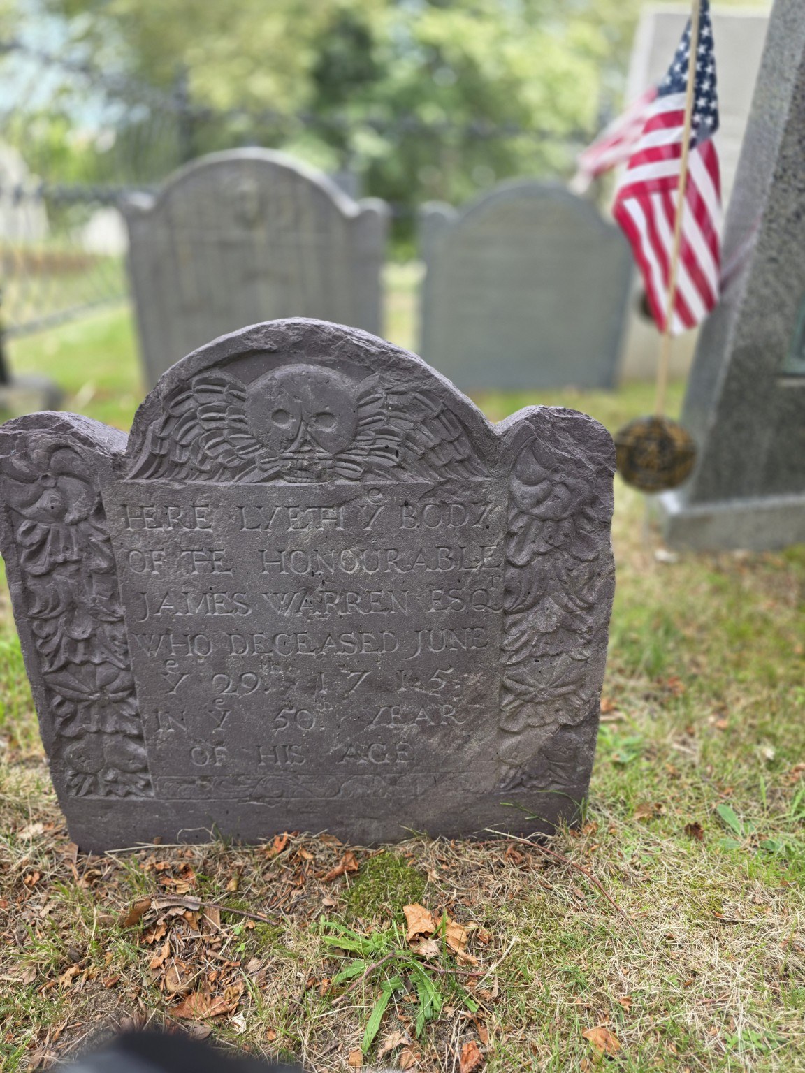 James Warren gravestone with winged skull