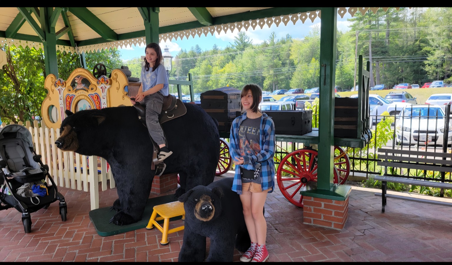 Children posing with bear photo props at Clark's Bears