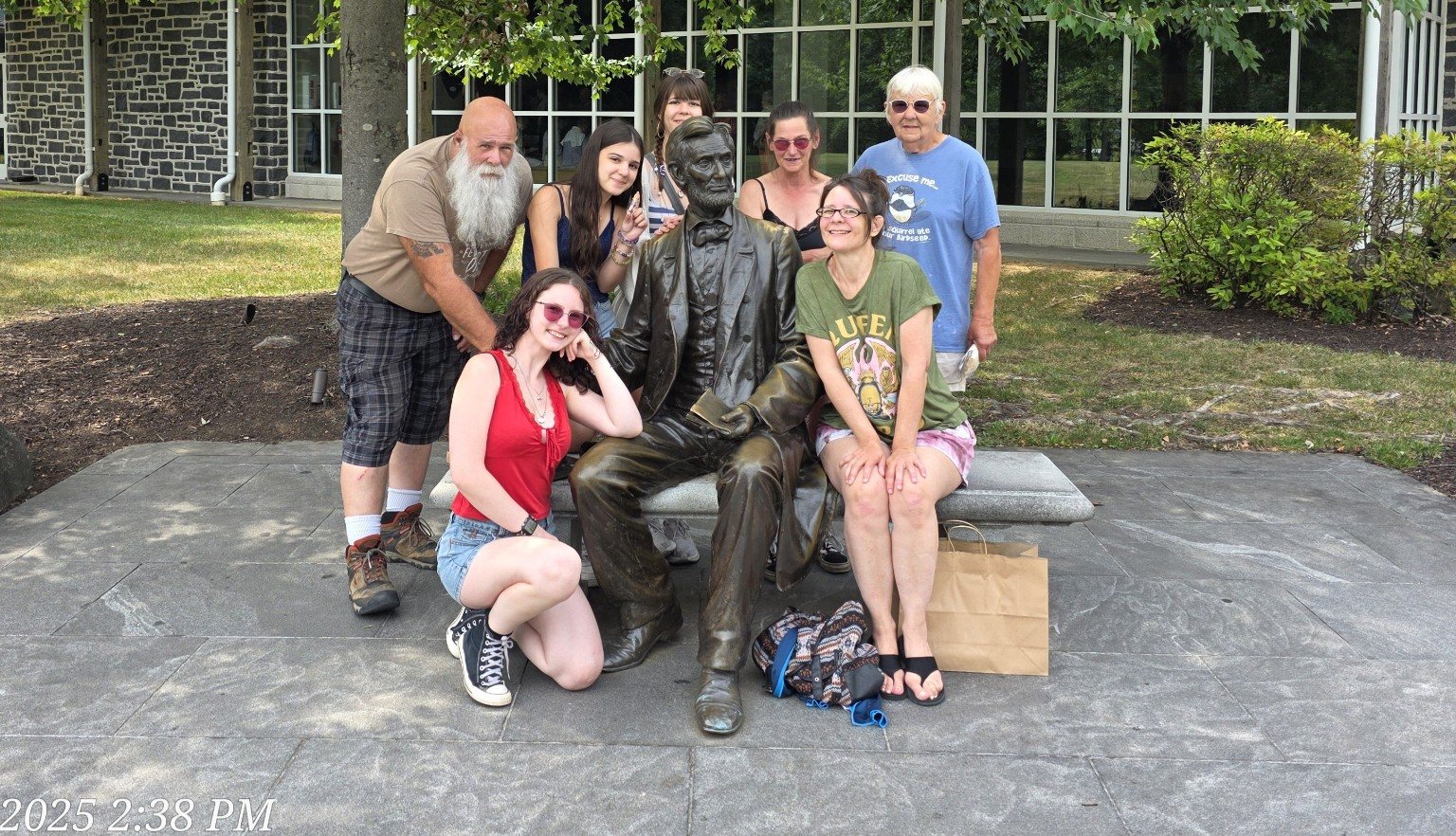 Family gathered around the Lincoln statue