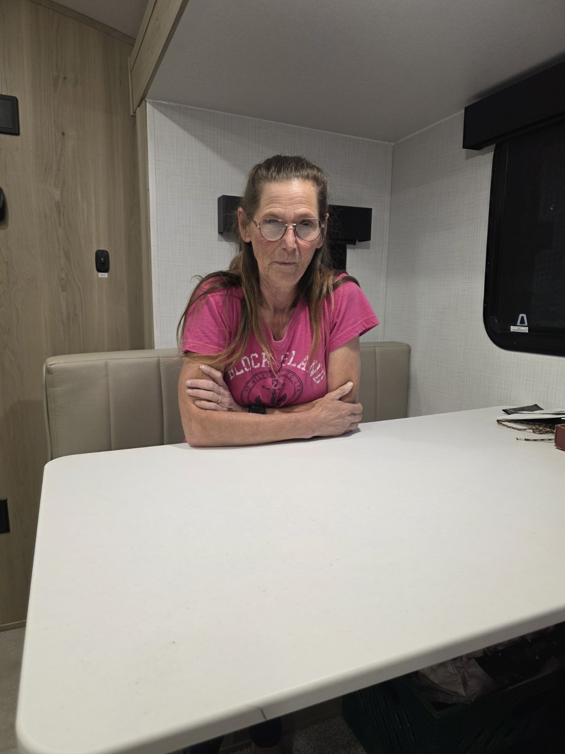Lisa seated at the Trail Tater dinette