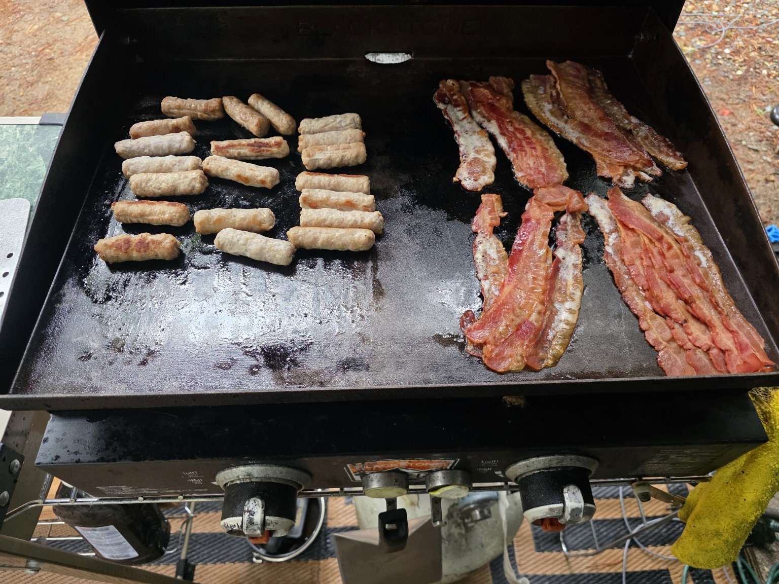 Bacon and sausage cooking