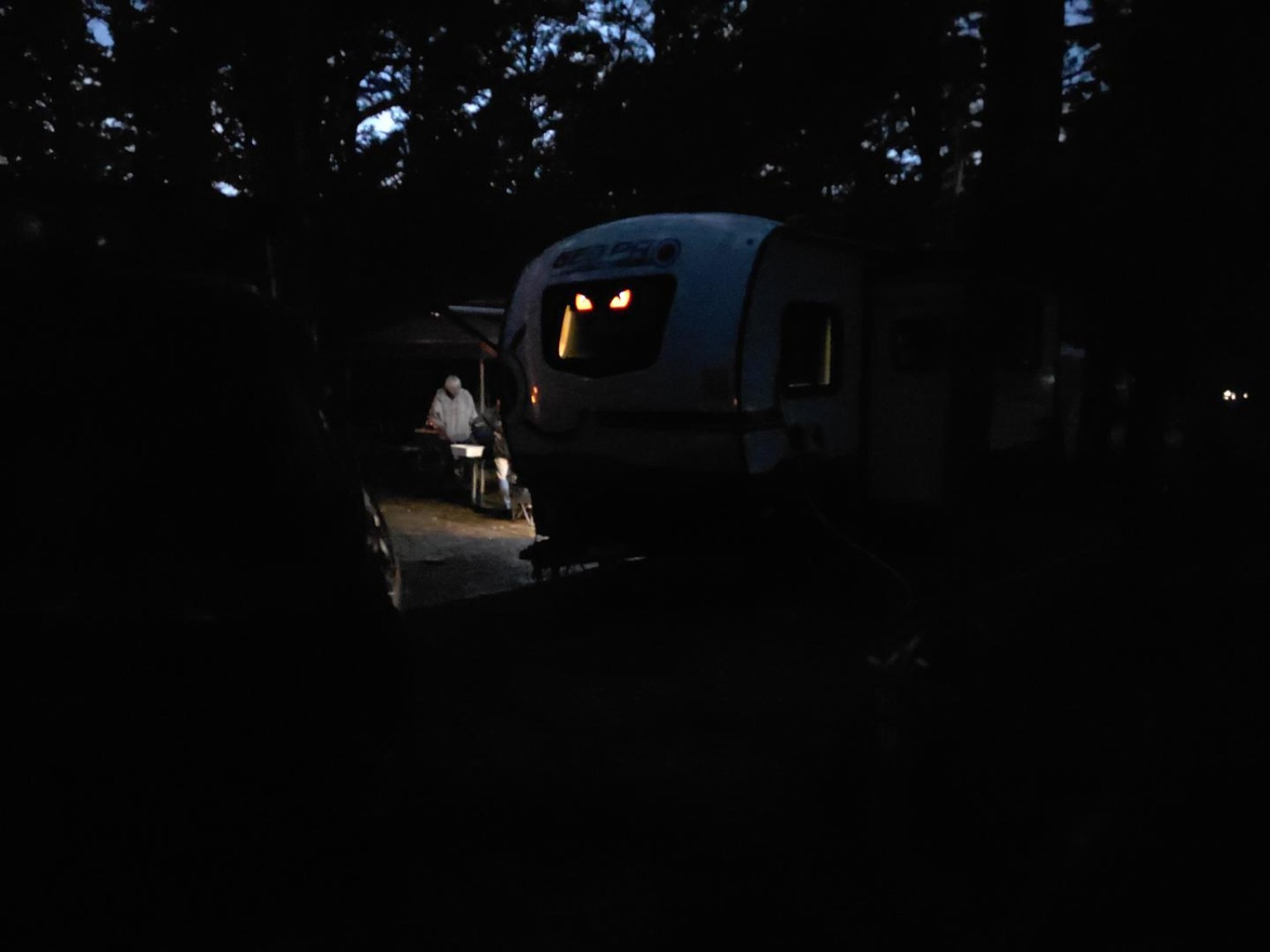 Trail Tater glowing with red eyes in the dark