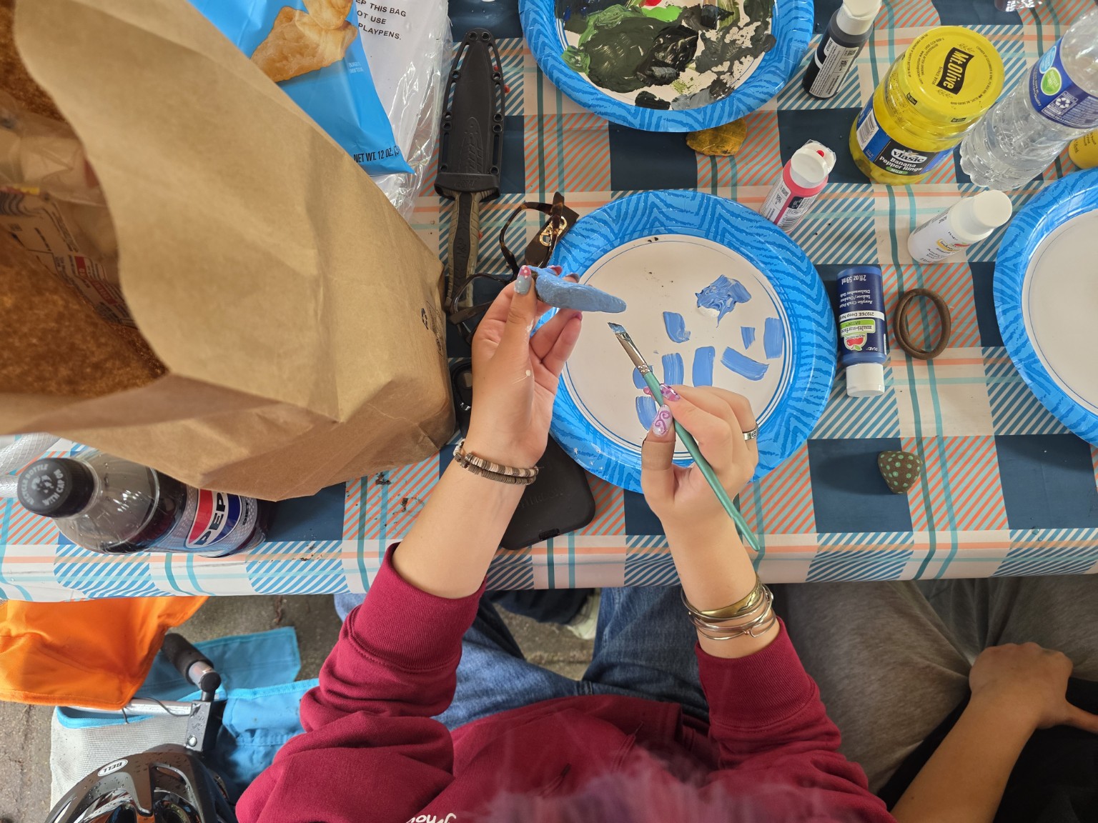 Painting a small rock blue