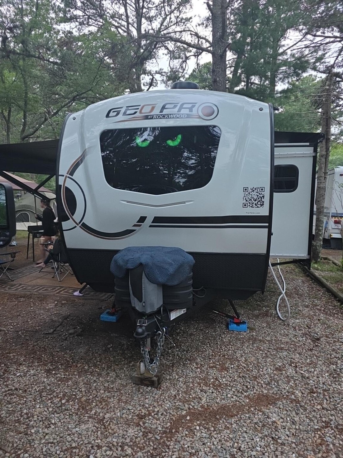Trail Tater glowing with bright green LED eyes at the Sandy Pond campsite