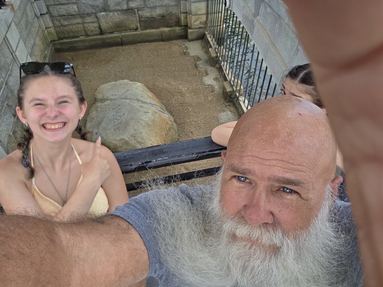 Family selfie above Plymouth Rock